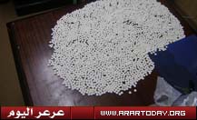 أمن الطرق بعرعر يضبط أكثر من (3200) حبة مخدرة ومبالغ مالية وجوالات (صور للمضبوطات)